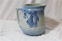 An Antique Stoneware Pitcher