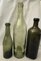 Lot of 3 green glass bottles
