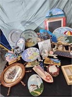 Beachy decor.  Wall hangings , clock. Plates.