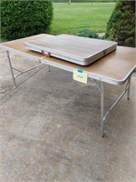 Two folding tables - 8 ft and 6 ft long