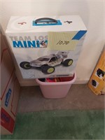 RC car (NIB) and bucket of toys