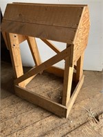 Wood saddle stand.