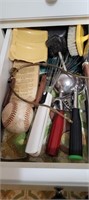 contents of drawer, 2 scoops, pie servers, etc