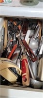 drawer full of utensils