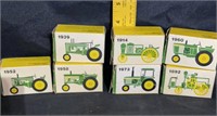 7 miniature John Deere tractors in box
