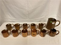 12 pc copper pitcher and mugs some are Moscow mule