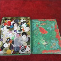 Cardinal tin full of vintage sewing buttons.