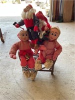 Dolls with twig bench