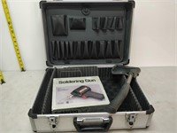 soldering gun and hatchet in case
