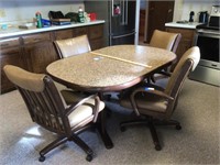 Chromecraft Brand Table and 4 rolling chairs