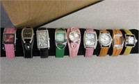 9 Fashion Wrist Watches On Padded Display