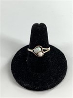 Sterling silver and opal ring size 8 1/2 weighs 2.