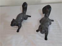 2 black ceramic squirrels