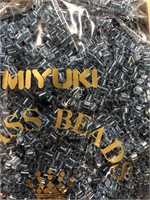 Miyuki 4 mm glass cube beads. Blue lined