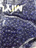 Miyuki 5 mm glass pony beads. Transparent cobalt