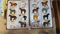 International show horse collection in case with