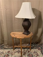 Wooden table and table lamp