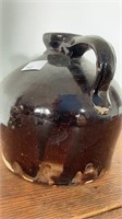 Antique pottery pitcher, brown glaze, embossed G,