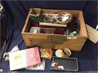 Vintage crate filled with buttons and sewing