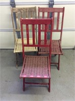 Three vintage wood folding chairs