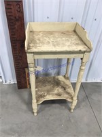 Yellow wood stand
