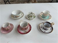 Assorted Teacups with Matching Saucers