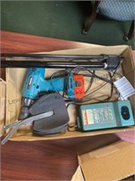 Battery powered Makita drill and charger 24 inch