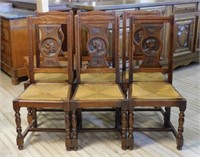 French Breton Style Portrait Carved Oak Chairs.