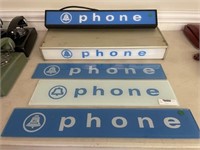 5 Phone Advertising Signs on Plate Glass