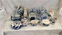 Collection of blue sugars, creamers, pitchers and