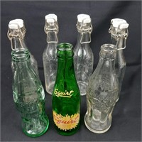 Vintage glass bottles including Coke