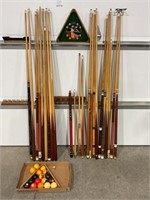 POOL TABLE W/ LARGE SELECTION OF POOL CUES,