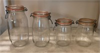 Lot of 4 Arc France Glass Canisters