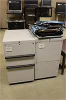 2 metal rolling storage cabinets