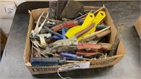 Misc box of pliers, screwdrivers, snips, putty