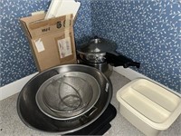 large stainless steel bowl, preasure cooker, etc.