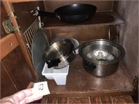 Contents of lower Cabinet Cookware