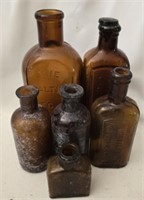 Lot of 6 brown glass bottles