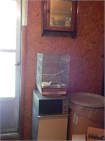 vintage trash copactor, metal birdcage, cabinet