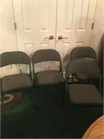 4 folding chairs with padded seats