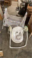 Folding playpen and. Baby swing.