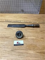 Vintage chisel and handheld tachometer