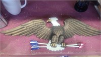 Metal eagle plaque 27in across