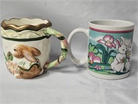2 EASTER MUGS ONE IS WMG BOTH ABOUT 3.5"