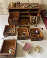 Wooden jewelry box with jewelry
