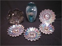 Six iridescent glass bowls from 9" to