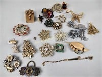 Costume jewelry including brooches