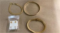 3 bracelets and earrings