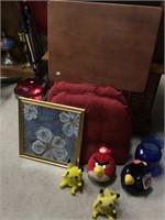 assorted stuffed caricatures and household items