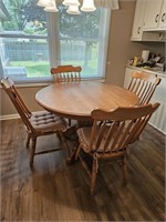 Dining table w/ 4 chairs and 2 leaf inserts